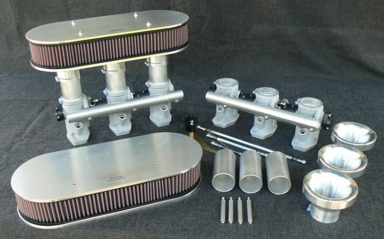 Throttle body with double open end oval shaped filter